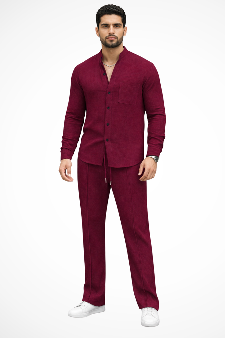 Men's two-piece outfit featuring a textured button shirt and matching trousers, perfect for casual occasions and stylish comfort. 2