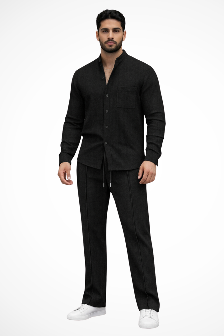 Men's two-piece outfit featuring a textured button shirt and matching trousers, perfect for casual occasions and stylish comfort. 9